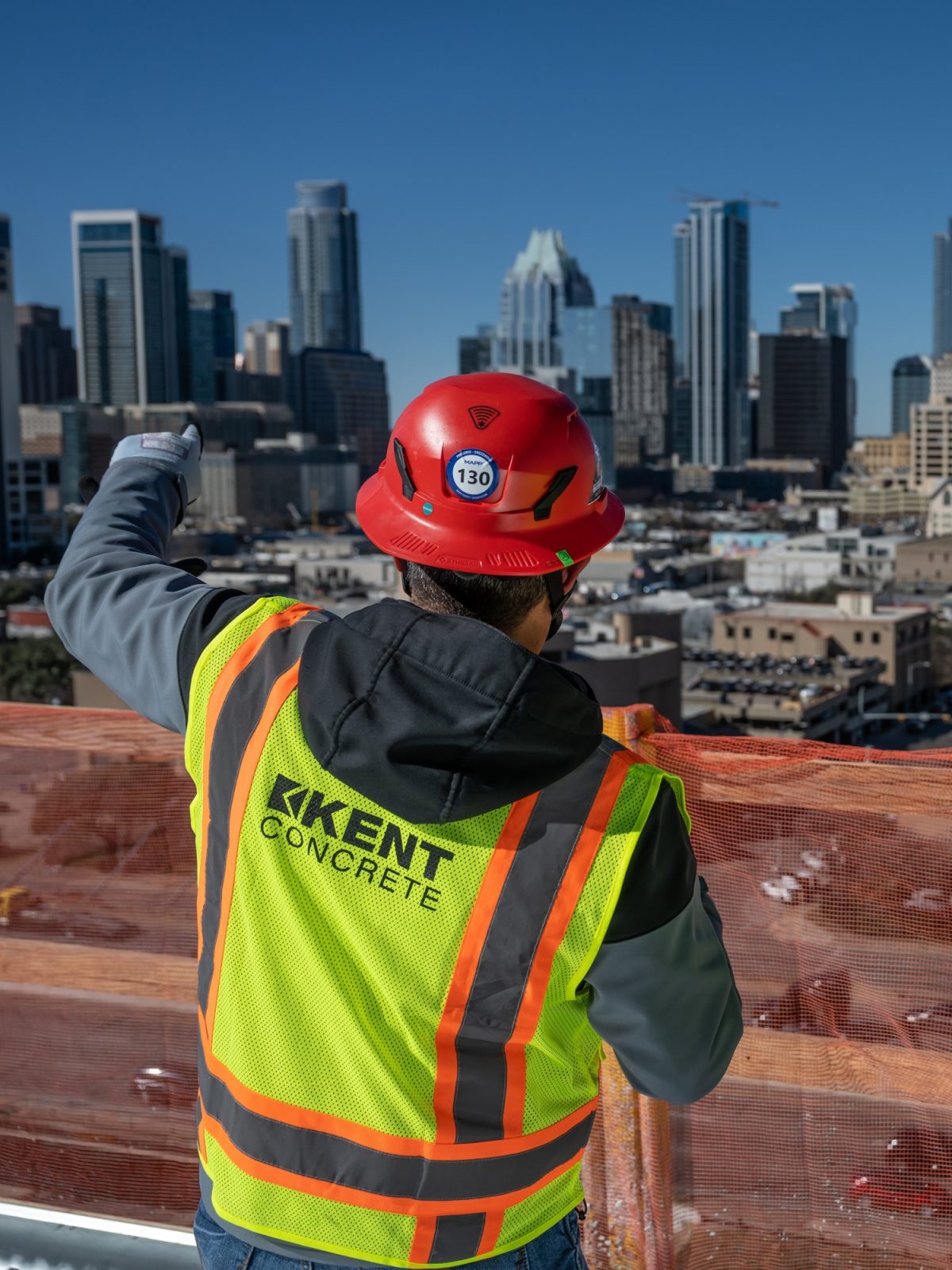 Downtown austin skyline construction workers in hi vis